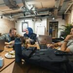Technology leaders reviewing readiness in a modern office meeting